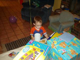 Colton opening birthday presents
